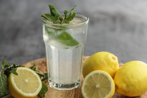 Is it healthy to consume lemon water on an empty stomach?